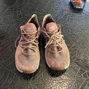 Nike Free rose gold shoes